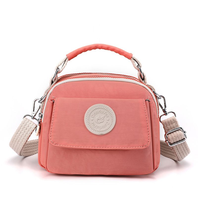 new women's fashion trend crossbody bag simple waterproof water bag lipstick change portable handbag_voghion.com