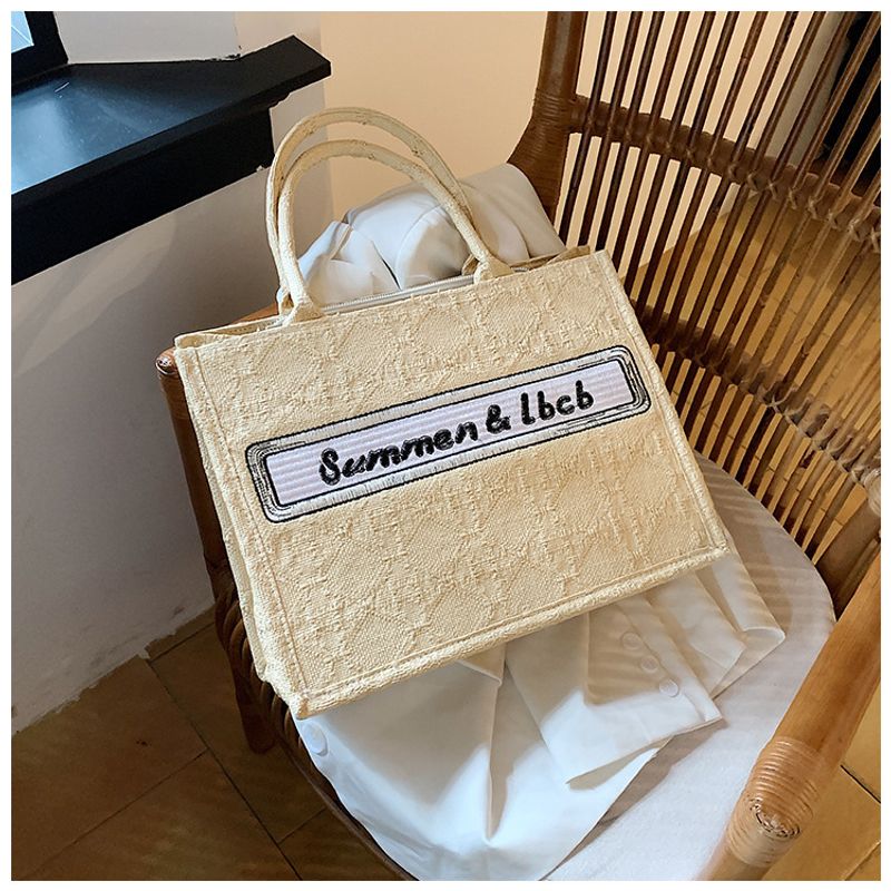 Baigou Wholesale Bag Women 2023 New European and American Trend Portable Canvas Bag Large Capacity Embroidered Alphabet Tote Bag_voghion.com