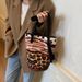 Borsa a secchiello da donna con stampa leopardata, illustrazione, borsa a secchiello con giunzioni, grande capacità, design alla moda, borsa a tracolla da donna_voghion.com