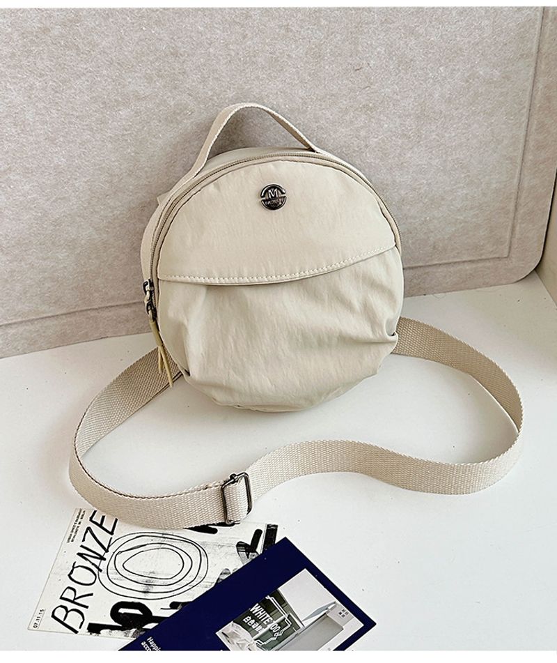 Nouveau petit sac rond pour femme, sac à bandoulière simple et décontracté en tissu nylon, design de niche, sac à main de grande capacité et_voghion.com