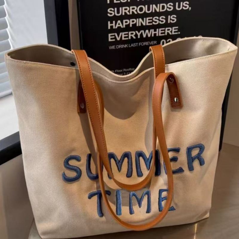 Borsa a tracolla versatile di grande capacità in tela con lettere ricamate, 2025, per studenti universitari_voghion.com