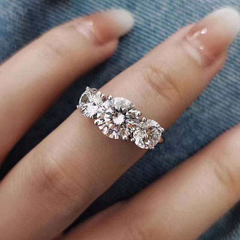 S925 Sterling Silber D Farbe Moissanite Drei Stein Weiblichen Ring High-End Koreanische Version Einfache_voghion.com
