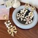 Handmade Series Pearl String Bow Shape Keychain Pendant Metal Diamond Bag Pendant Gift_voghion.com