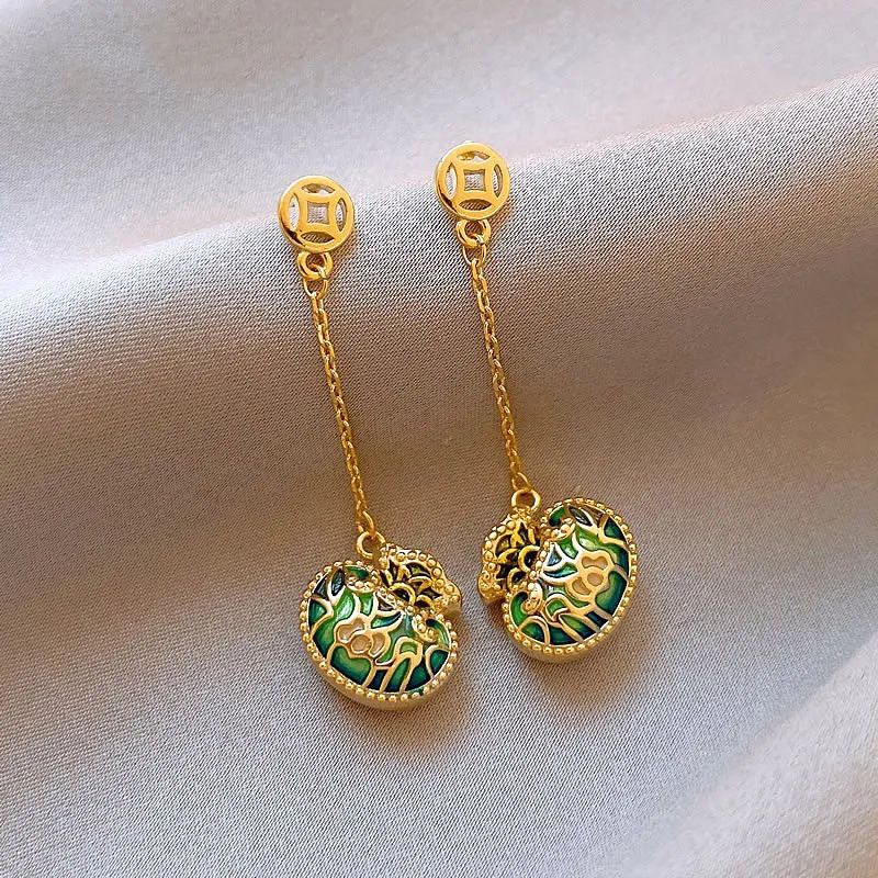 Zilveren naald, geldzak, kwastje dames Chinese stijl licht luxe bedel oorbellen, 2024 nieuwe collectie van 100 high-end_voghion.com