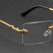 1 elegante gouden frameloze bril met unieke metalen poten in de vorm van een slang, geschikt voor dagelijks gebruik door mannen en vrouwen_voghion.com