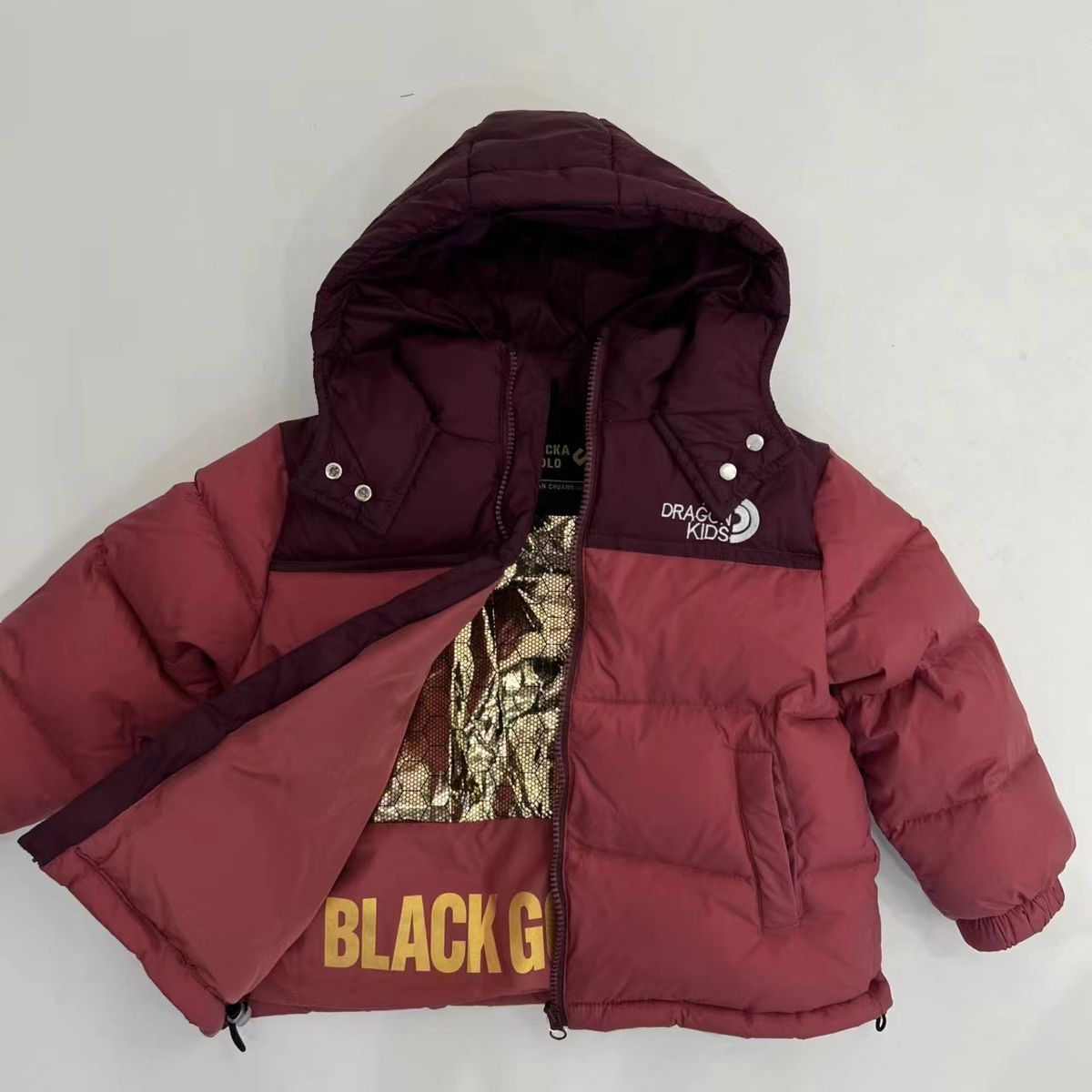 "Unisex kinderjack met fleecevoering en capuchon - warme pufferjas met nylon buitenkant voor jongens en meisjes (zwart/bordeauxrood/groen/paars)"_voghion.com