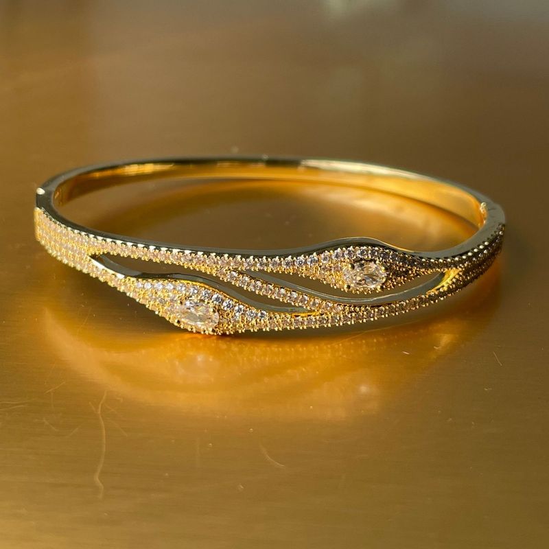 Bracciale creativo con occhio di demone, zircone e diamanti, design a croce cava_voghion.com