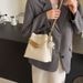 Large Capacity Bucket Bag Women's 2025 New Design Texture Fashion With Plush Toy Pendant Shoulder Bag_voghion.com