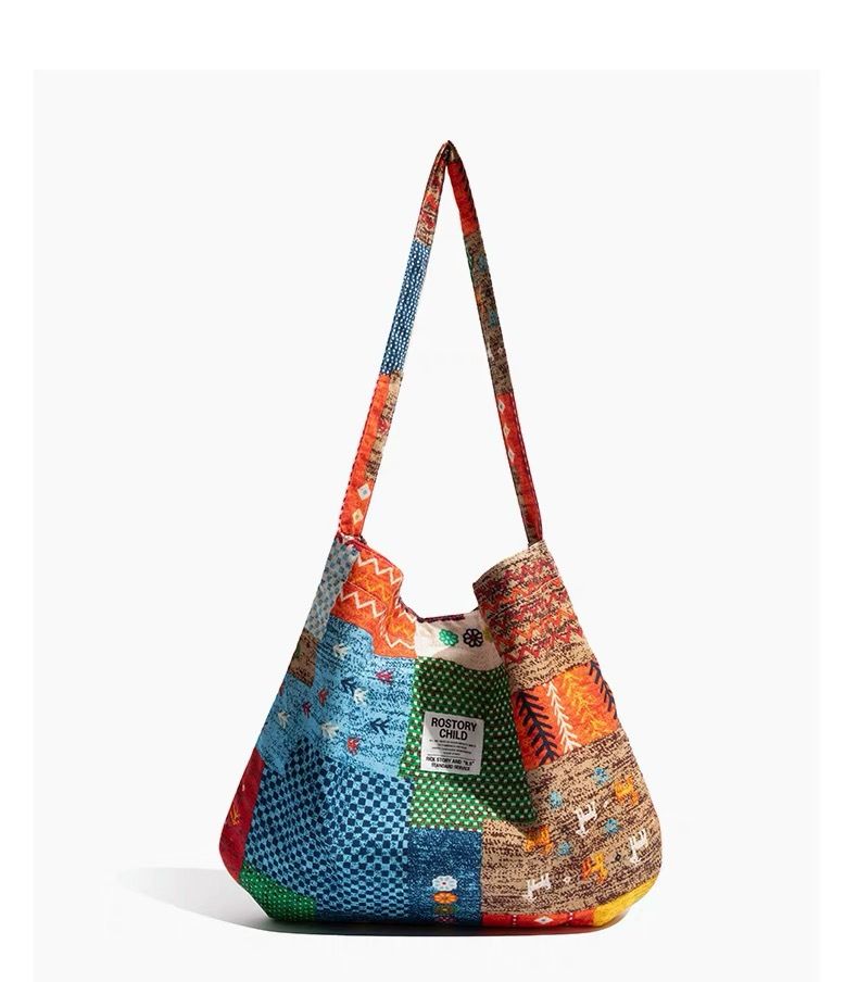 Borsa a tracolla etnica in denim bohémien, in tela bifacciale, patchwork vintage originale nepalese per donna_voghion.com