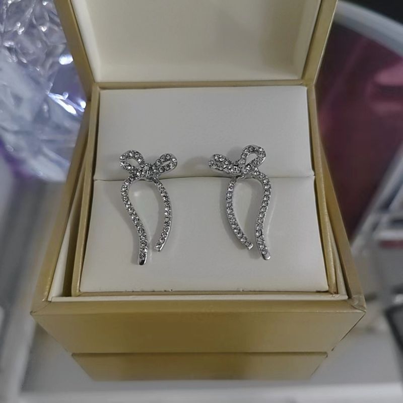Dameøreringe Shining girl ~ diamantsløjfeøreringe til kvinder, sødt temperament, let luksus og high-end koreansk stil ins øreringe trend_voghion.com