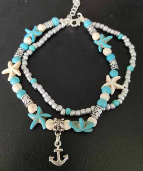 Fashionable minimalist turquoise, starfish, and turtle foot decorations with beach style double layered ankle chains_voghion.com