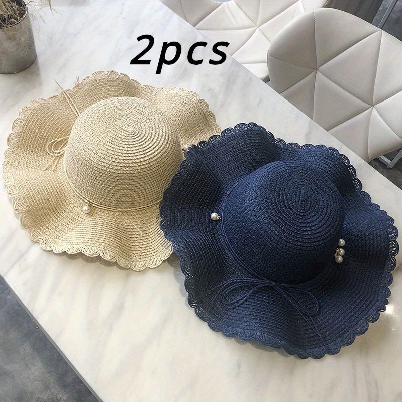 2 modieuze zomerse, frisse, golvende, grote strohoeden met brede rand, veelzijdige, casual strandparasols_voghion.com