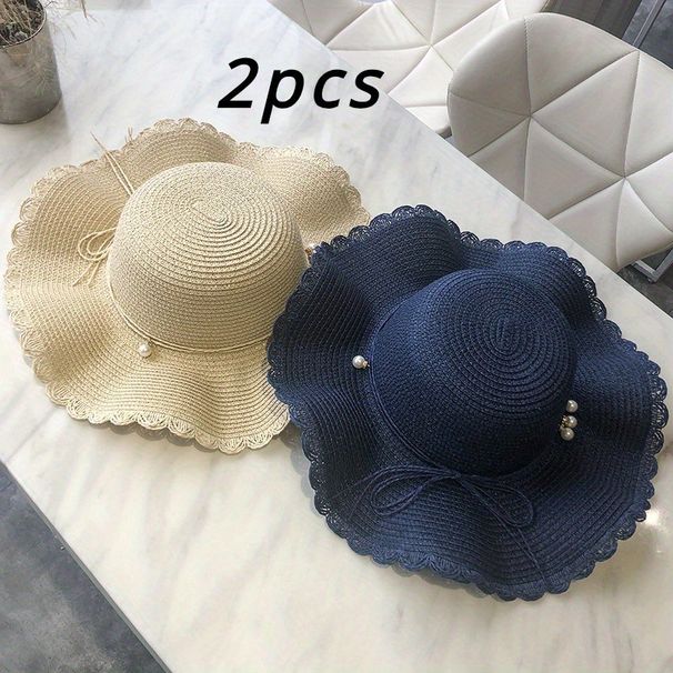 2 modieuze zomerse, frisse, golvende, grote strohoeden met brede rand, veelzijdige, casual strandparasols_voghion.com