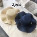 2 modieuze zomerse, frisse, golvende, grote strohoeden met brede rand, veelzijdige, casual strandparasols_voghion.com