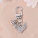 Ciondolo per borsa con ali d'angelo a forma di cuore, stile giapponese e coreano, con strass, custodia per auricolari e fotocamera._voghion.com