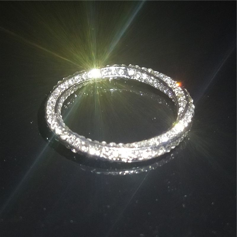 Anello unisex con zircone e strass da sposa con striscia di Mobius e diamanti Hip Hop_voghion.com