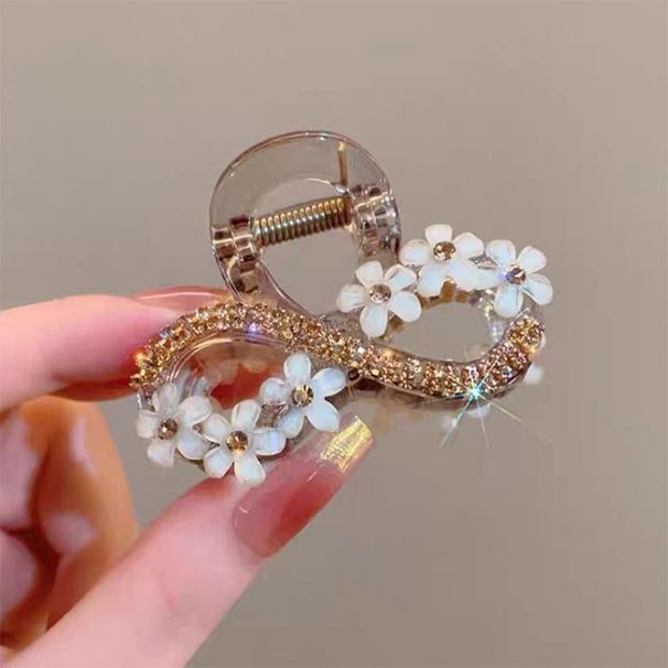 Elastici per capelli di medie dimensioni a forma di fiore da donna, legati a metà dietro la testa, per mettere in risalto il volume, elastici per capelli Shark Clips_voghion.com