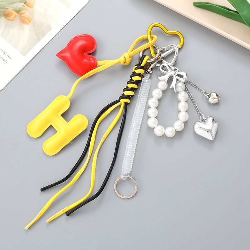 Portachiavi con ciondolo a forma di cuore con fiocco e perline della serie Miu, stile femminile_voghion.com