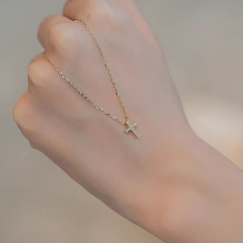 Collana mini croce in argento sterling placcato oro 14K con un design di nicchia, temperamento squisito e minimalista_voghion.com