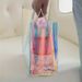 Nőnapi stílusú kézi ajándékcsomagoló táska átlátszó lézeres műanyag PVC illúziós szín_voghion.com