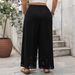 Vêtements pour femmes printemps et été nouveaux produits pantalons amples à jambes larges grande taille ourlet creux pantalons noirs_voghion.com