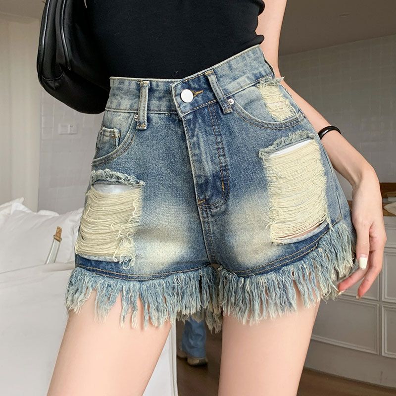 Ragged edge design denim shorts, female internet celebrity Instagram, worn out, niche, and distressed A-line tassels,_voghion.com