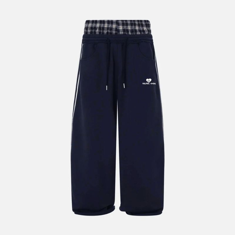 ​​Herren-Jogginghose im Streetwear-Stil – Lockere Passform mit weitem Bein und seitlichen Streifen​​_voghion.com