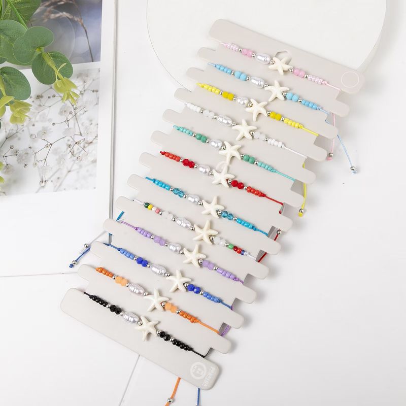 Set di braccialetti di perline fatti a mano con perline di cristallo, conchiglie, stelle marine e perline colorate alla moda_voghion.com