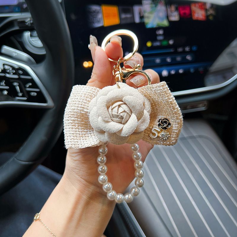 Personalized pearl chain, small fragrance bow, camellia creative and exquisite car keychain, bag decoration, female_voghion.com