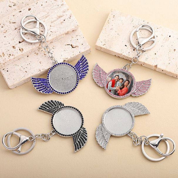 Portachiavi alla moda in stile hip hop con ala e strass: accessorio fai da te unico per uomini e donne (argento, diamante nero/rosa/bianco/blu)_voghion.com