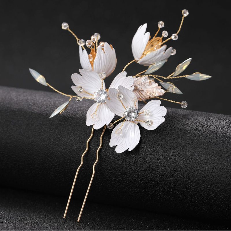 Portafiori bianco in cristallo a forma di U forcina per capelli copricapo da sposa_voghion.com