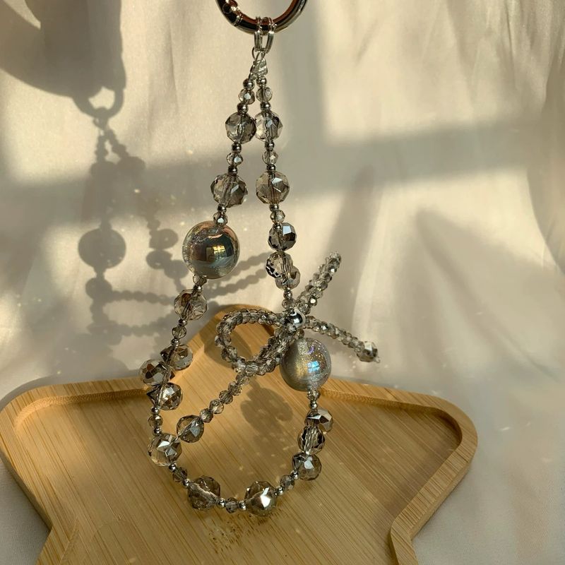 Conjuntos y paquetes de accesorios para teléfono, pulsera de PVC, cadena para teléfono móvil, nuevo colgante de lazo de cristal de verano, funda para teléfono móvil con cordón_voghion.com
