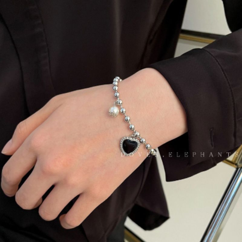 Braccialetto di coppia in acciaio al titanio con perla a forma di cuore nero per donne e studenti, alla moda e con temperamento._voghion.com
