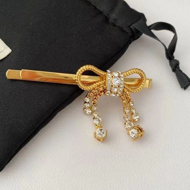 Fermaglio per capelli classico da donna, con fiocco, in cristallo scintillante e brillante, alla moda_voghion.com