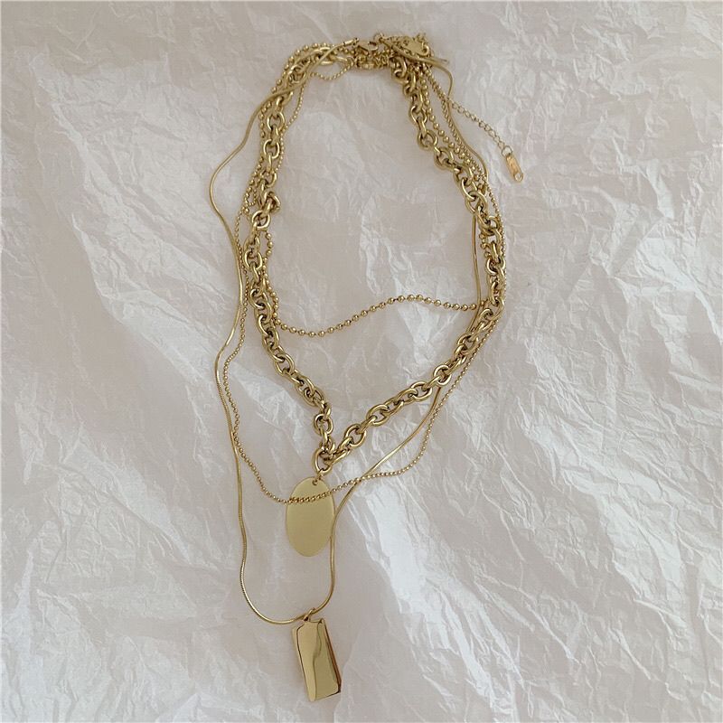 Collana in acciaio al titanio con catena per clavicola a più strati, con ciondolo a forma di marchio Garden, da donna_voghion.com