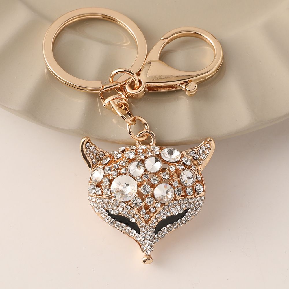 Portachiavi con ciondolo a forma di testa di volpe con strass, piccolo regalo per auto e borsa alla moda_voghion.com
