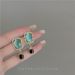 Designer Elements Light Luxury High Grade Cat Eye Stone Earrings Retro Earrings Women's Fashion Simple Earrings_voghion.com