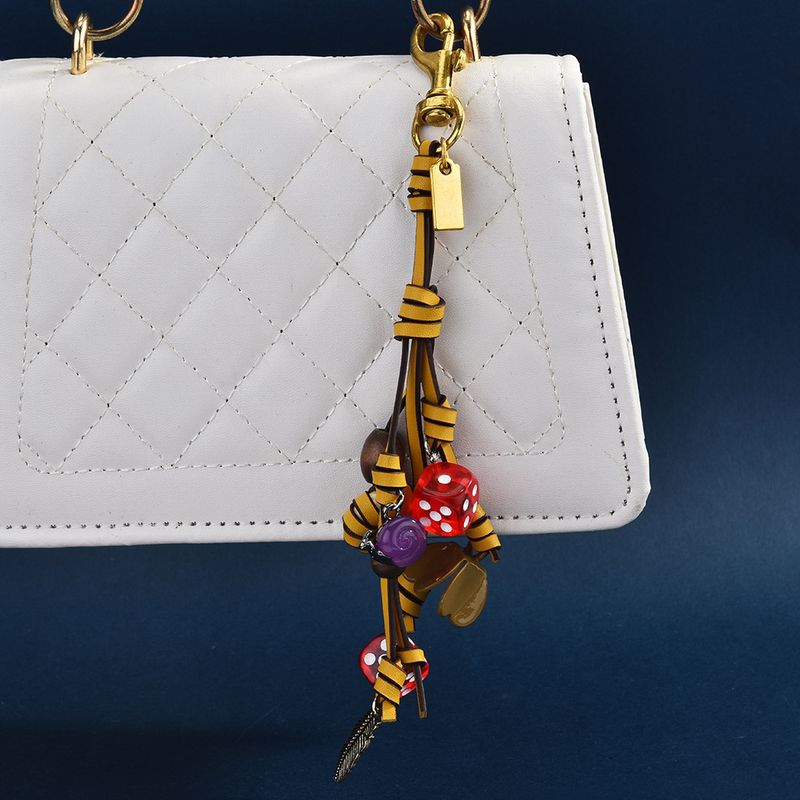 Ciondolo per borsa in pelle intrecciata a forma di fiore, setaccio a forma di lumaca, estremamente fatto a mano, portachiavi con corda da arrampicata da donna_voghion.com