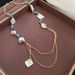 Collana da donna versatile alla moda, con catena per clavicola, stile bohémien, con conchiglia quadrata irregolare e ciottoli._voghion.com