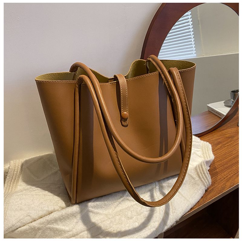 Korean Version Of Solid Color Mother Bag 2023 New Women's Bag Simple Portable Tote Bag Large Capacity Commuting Fashion Shoulder Bag_voghion.com