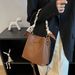 High-End Women's 2024 New Simple Trendy Versatile Niche Color-Block Textured Scarf Chain Handheld Bucket Bag_voghion.com