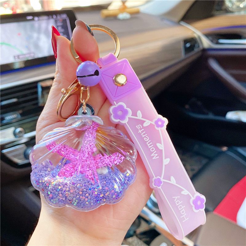 Porte-clés en forme de bouteille flottante de sable liquide, étoile de mer en fleur de cerisier, célébrité Internet, petit pendentif créatif en forme de cœur féminin_voghion.com
