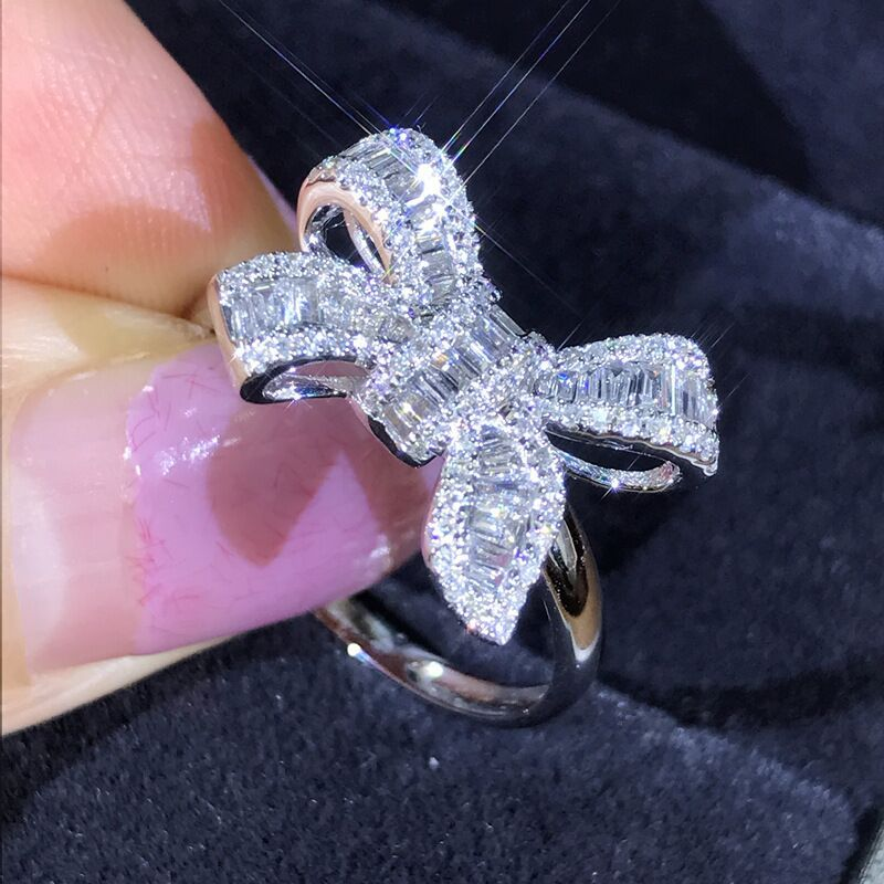 Yiwu Sanjie New Bow Ladder Square Beautiful and Luxury Simulation Diamond Temperament Women's Wedding Ring_voghion.com
