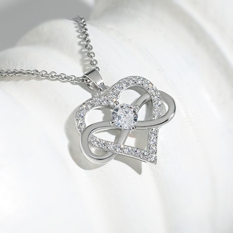 Pulloverkette mit 8-stelligem Pfirsichherz und Unendlichkeitssymbol, neue Nischen-High-End-Liebeskette mit Schleife_voghion.com
