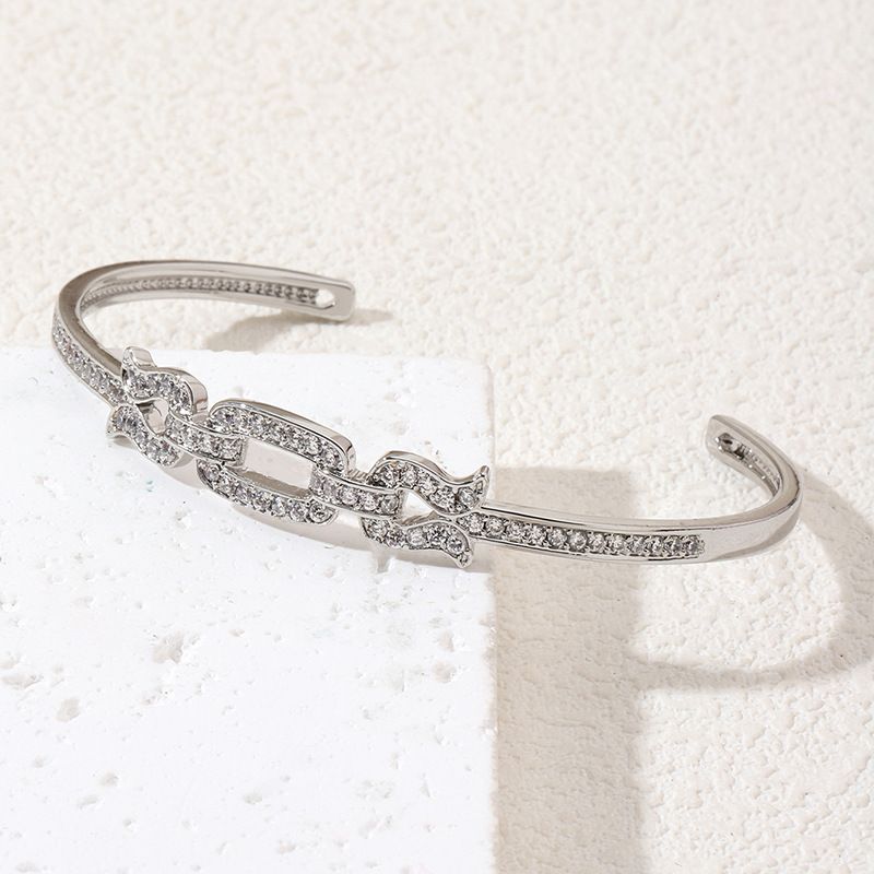 Bracelet jonc ouvert géométrique pour femme avec pierres de zircon irrégulières, design minimaliste tendance pour un usage quotidien_voghion.com