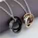Collana di coppia in titanio con ciondolo in acciaio inossidabile, anello ondulato a doppio cerchio, design di nicchia per gioielli da uomo_voghion.com