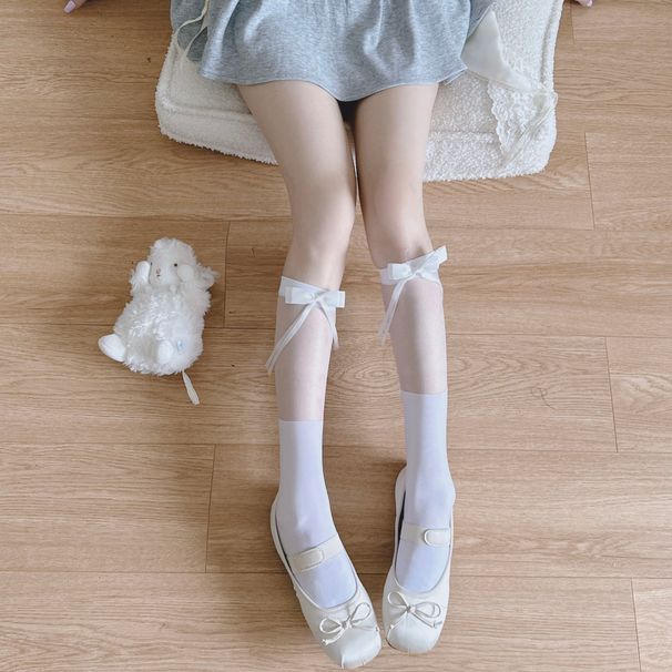 Calzini a metà polpaccio neri in seta di vetro con fiocco JK e spalle scoperte in velluto intrecciato Lolita primavera estate_voghion.com