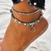 Fashionable minimalist turquoise, starfish, and turtle foot decorations with beach style double layered ankle chains_voghion.com