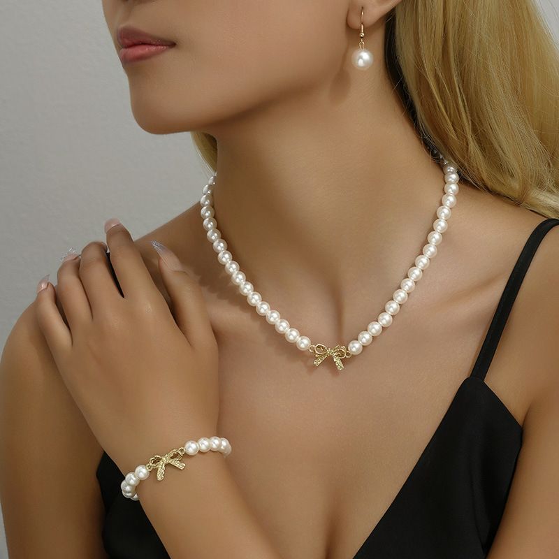 Trendy pearl bow earrings, bracelet necklace set, female creative and personalized geometric jewelry_voghion.com