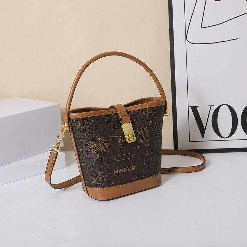 2023 Nuova borsa piccola di alta qualità di vendita calda Borsa a secchiello con stampa di moda da donna Borsa a tracolla versatile retrò con una spalla_voghion.com